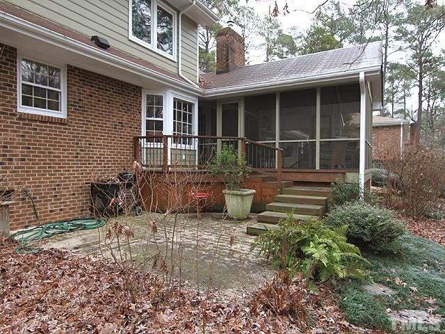 1605 Westhaven Drive Raleigh, NC 27607 - Photo 20 of 23 a front view of a house with garden and porch