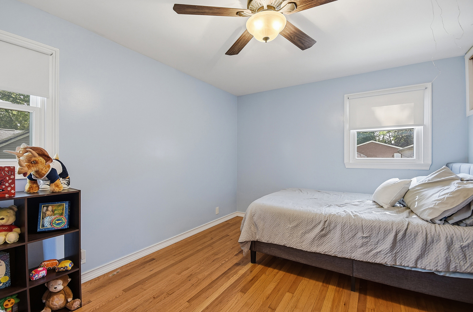 5155 West Main Street Monee, IL 60449 - Photo 16 of 19 a bedroom with a bed and a chandelier