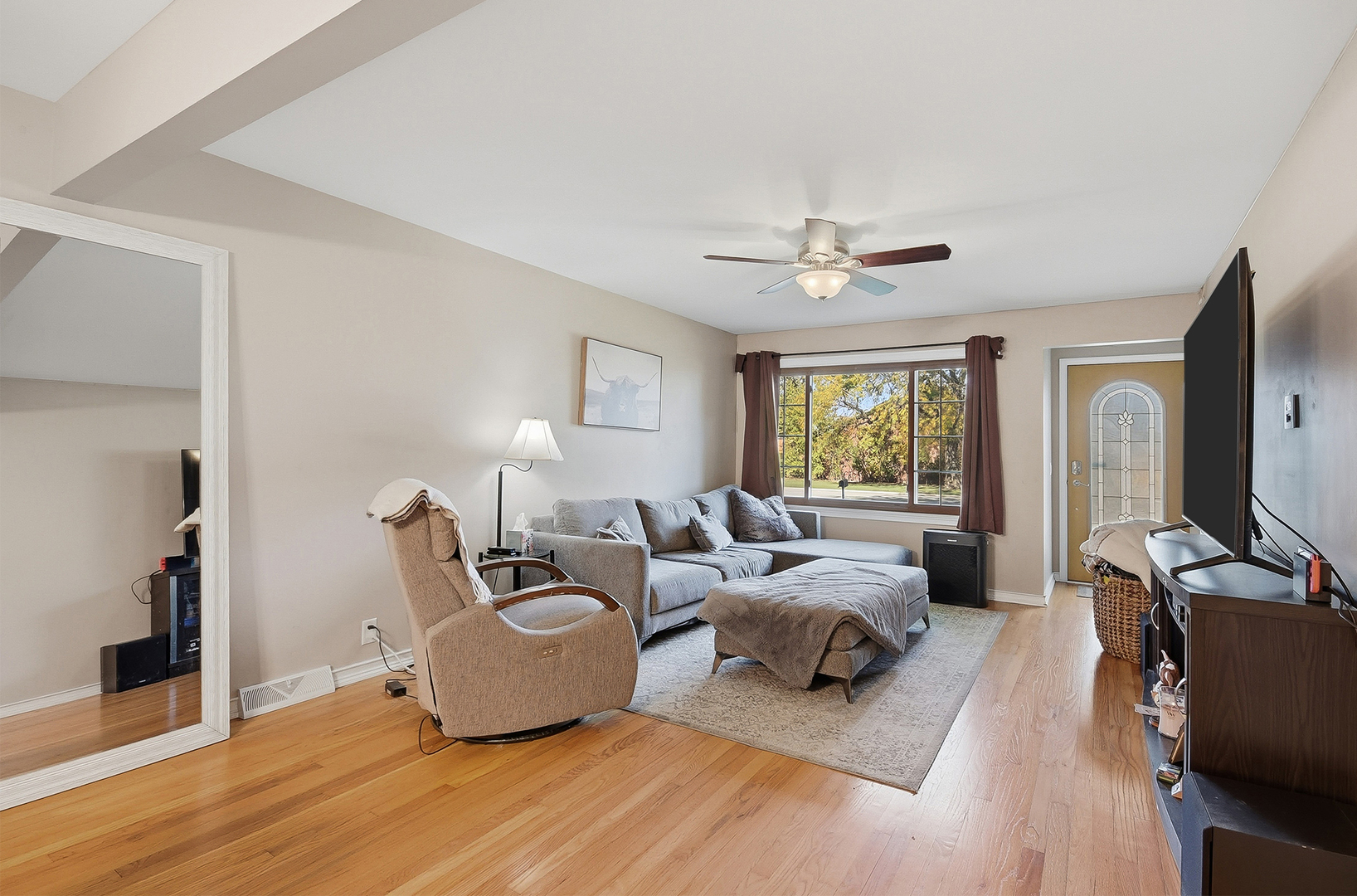 5155 West Main Street Monee, IL 60449 - Photo 10 of 19 a living room with furniture and a window