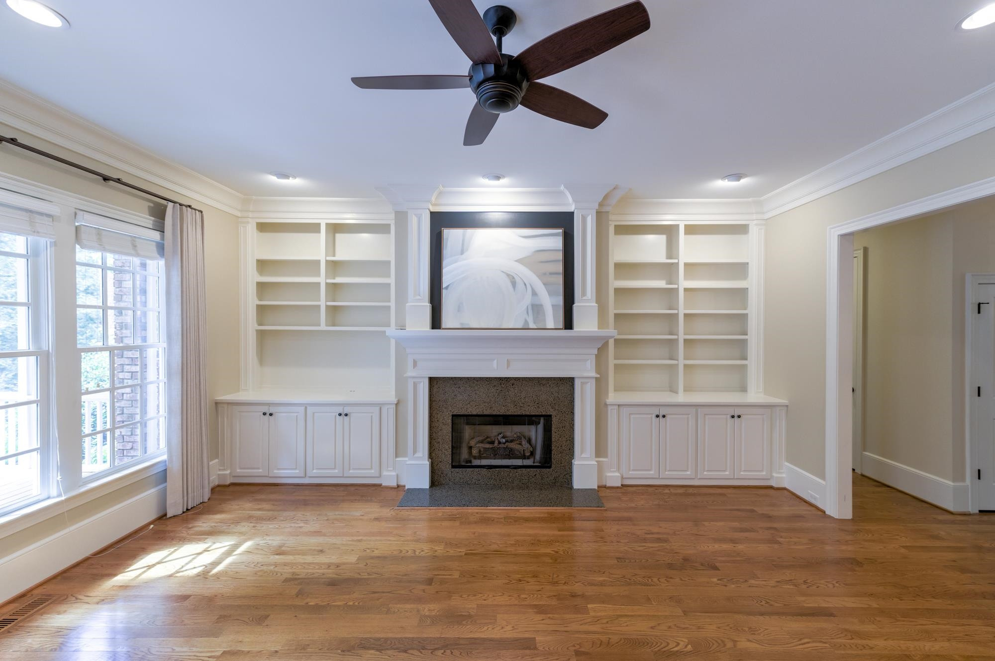 1417 Caistor Lane Raleigh, NC 27614 - Photo 6 of 42 Formal living area with custom built-ins and gas fireplace
