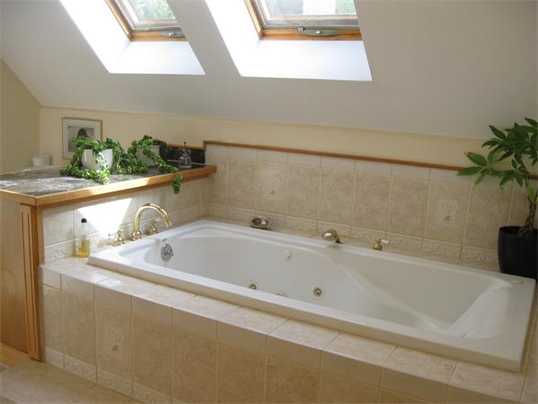 76 Taylor Road Stow, MA 01775 - Photo 14 of 27 a bathroom with a bathtub and sink