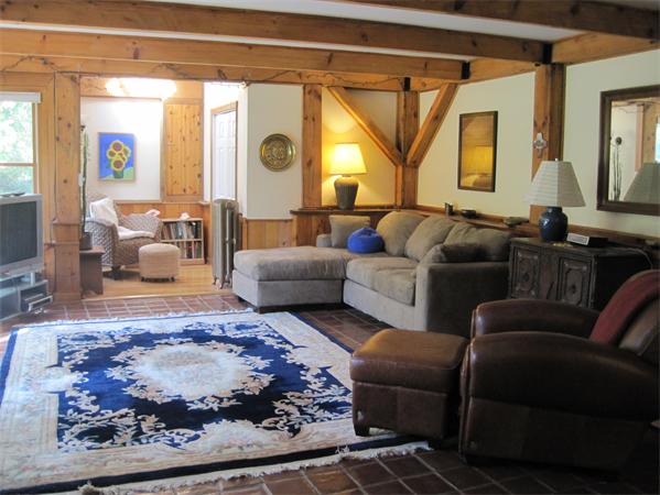 76 Taylor Road Stow, MA 01775 - Photo 16 of 27 a living room with furniture and a large window