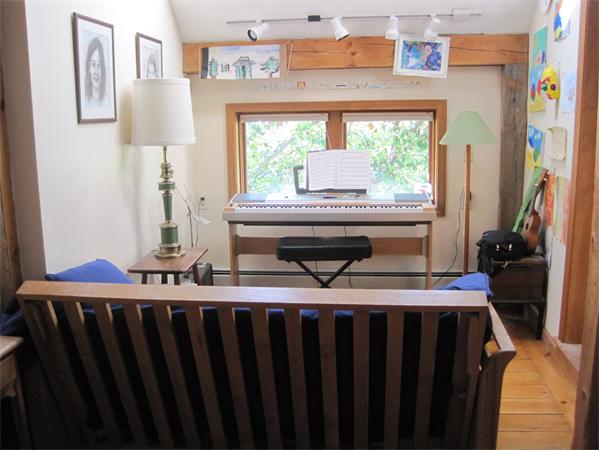 76 Taylor Road Stow, MA 01775 - Photo 20 of 27 a living room with a sink furniture and a window