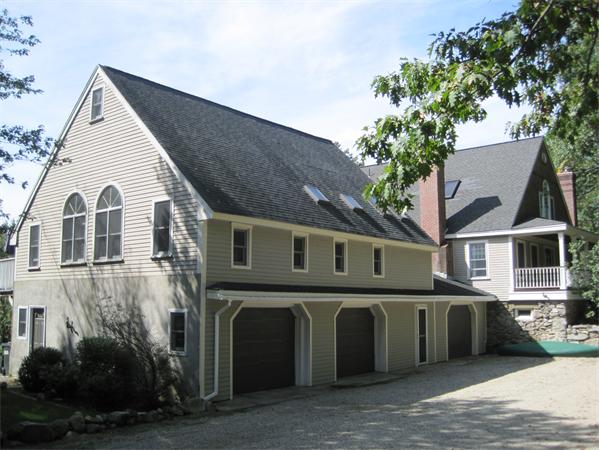 76 Taylor Road Stow, MA 01775 - Photo 2 of 27 a view of a house with a yard and potted plants