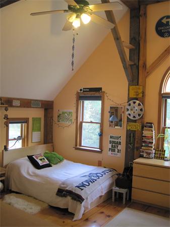 76 Taylor Road Stow, MA 01775 - Photo 23 of 27 a bedroom with a bed and a chandelier