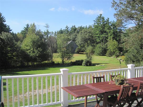 76 Taylor Road Stow, MA 01775 - Photo 24 of 27 a view of a deck with mountain view