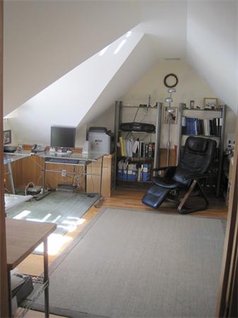 76 Taylor Road Stow, MA 01775 - Photo 6 of 27 a view of a livingroom with furniture and a flat screen tv