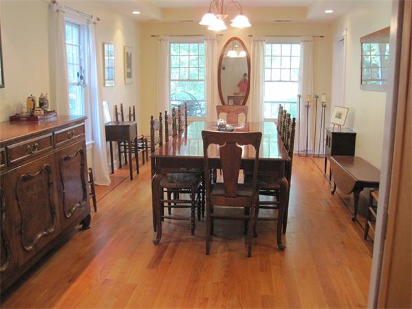 76 Taylor Road Stow, MA 01775 - Photo 7 of 27 a view of a a dining room with furniture window and wooden floor