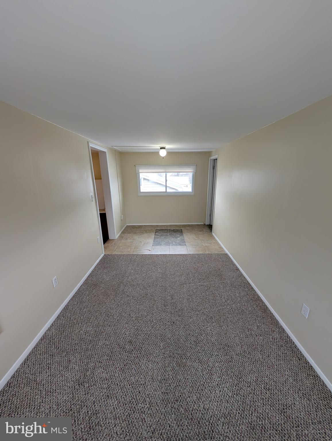 30 West Roland Road Brookhaven, PA 19015 - Photo 5 of 17 a view of a room that has a window in it