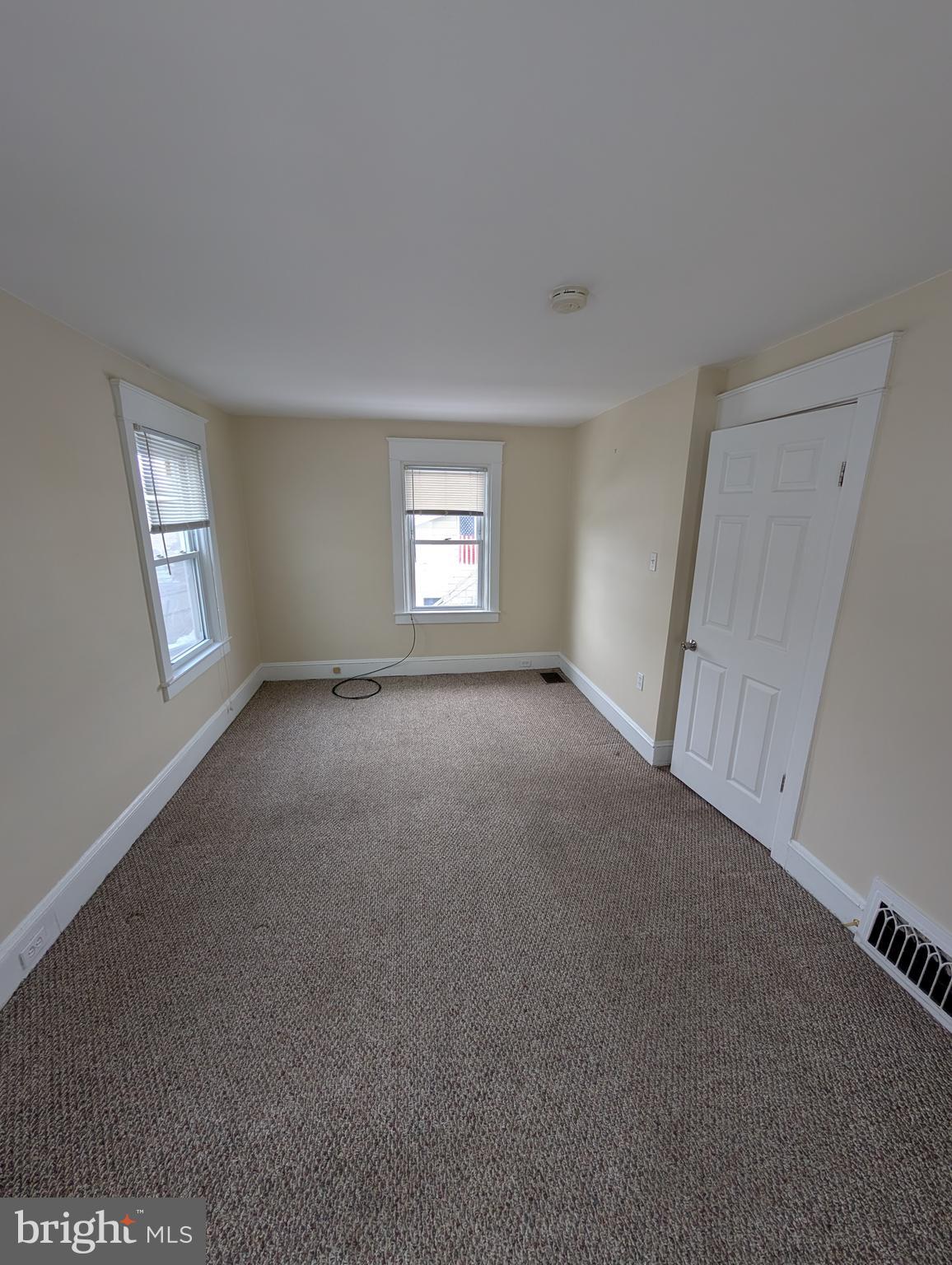 30 West Roland Road Brookhaven, PA 19015 - Photo 10 of 17 a view of empty room with windows