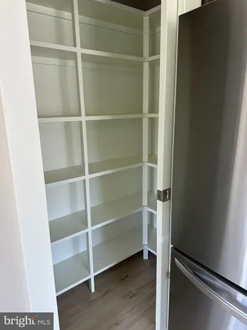 a view of an empty walk in closet