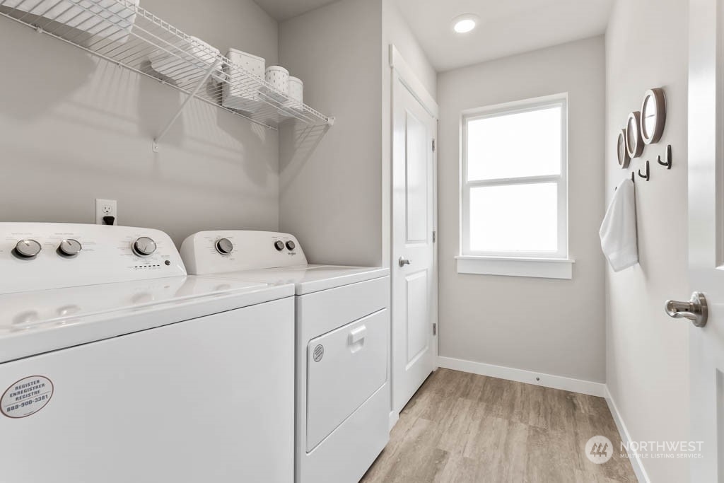 2728 193rd Place Southeast, Unit F11 Bothell, WA 98012 - Photo 22 of 29 a utility room with dryer and washer