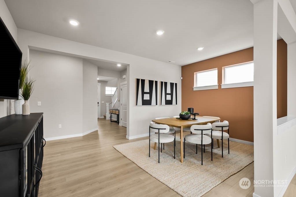 2728 193rd Place Southeast, Unit F11 Bothell, WA 98012 - Photo 6 of 29 a dining room with furniture and window