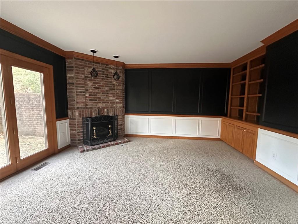 403 Landon Gate Pittsburgh, PA 15215 - Photo 11 of 27 a view of an empty room with a fireplace and a window