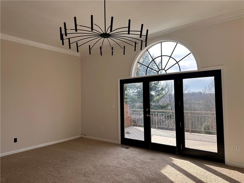 403 Landon Gate Pittsburgh, PA 15215 - Photo 12 of 27 an empty room with windows with view of ceiling fan