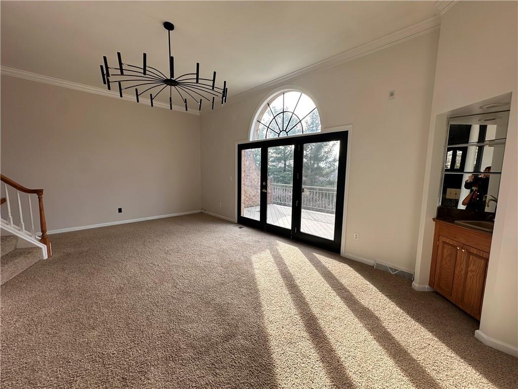403 Landon Gate Pittsburgh, PA 15215 - Photo 9 of 27 a view of a hallway with entryway wooden floor and windows