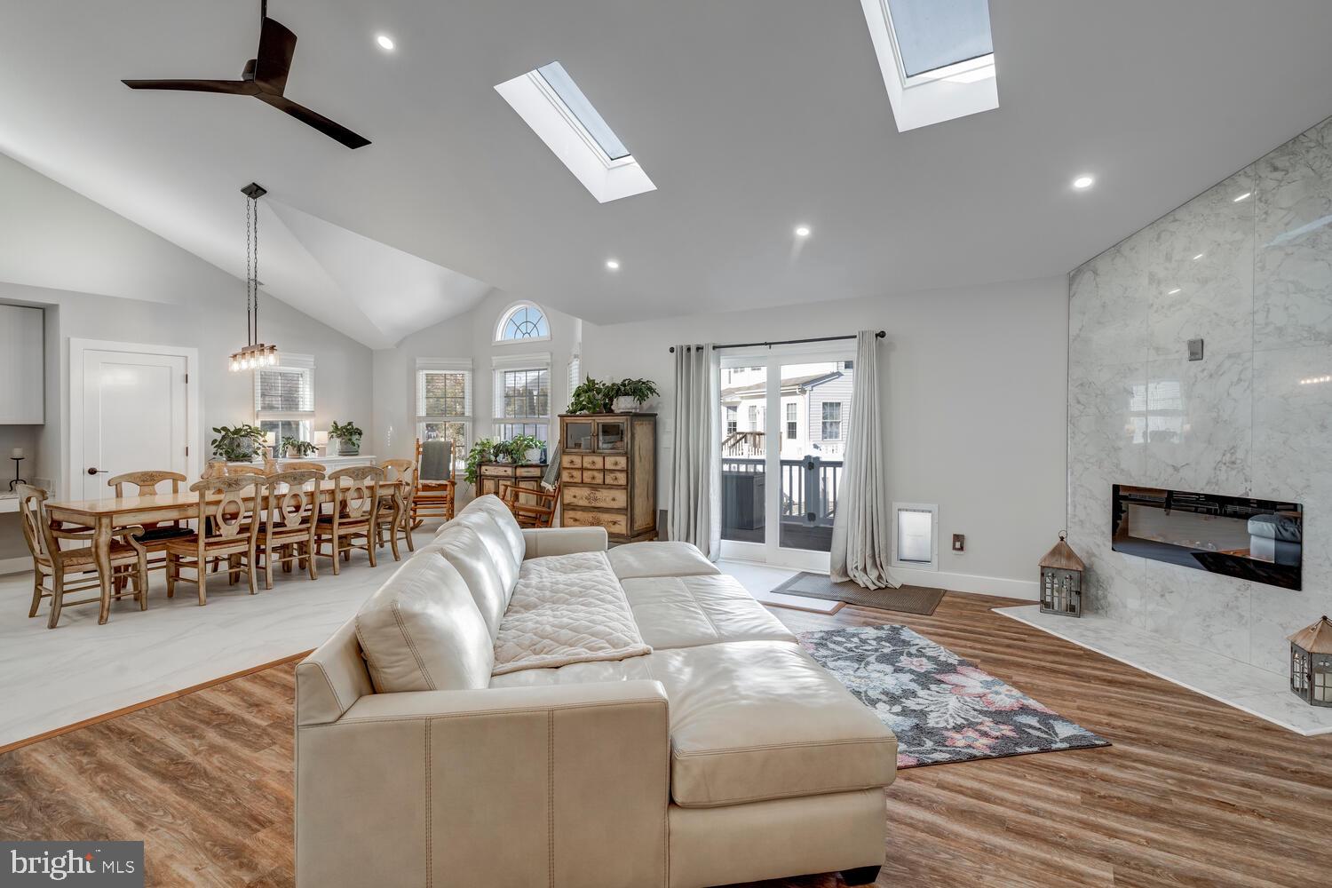 148 Compass Road Manahawkin, NJ 08050 - Photo 27 of 40 a living room with furniture window and wooden floor