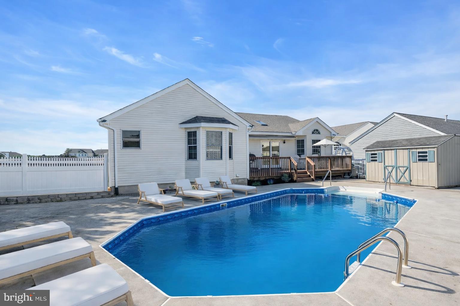 148 Compass Road Manahawkin, NJ 08050 - Photo 3 of 40 a view of a house with pool table and chairs