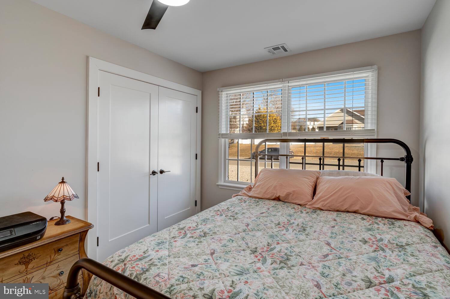 148 Compass Road Manahawkin, NJ 08050 - Photo 32 of 40 a bedroom with a bed and wooden floor