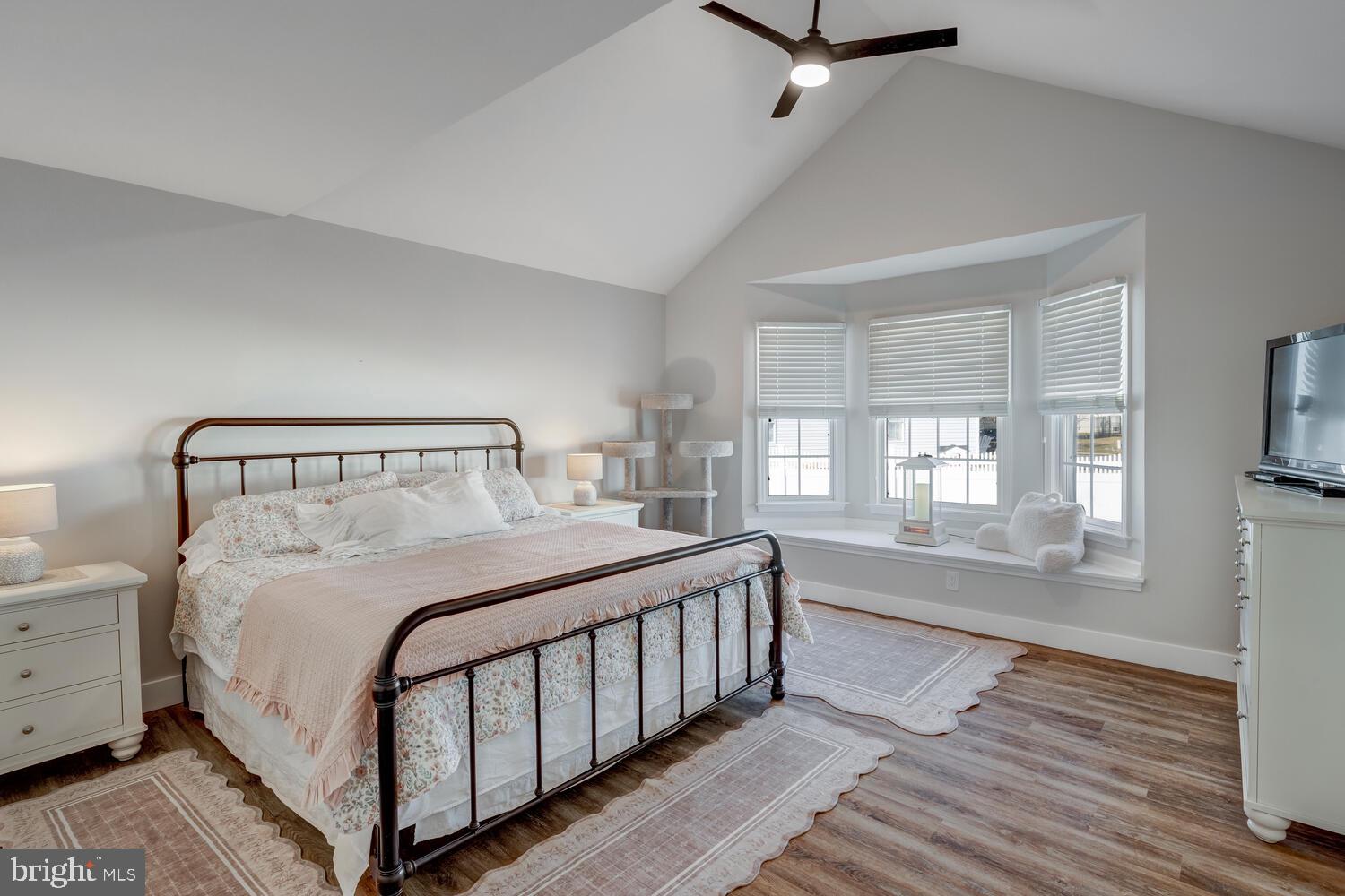 148 Compass Road Manahawkin, NJ 08050 - Photo 34 of 40 a bedroom with a bed and a window