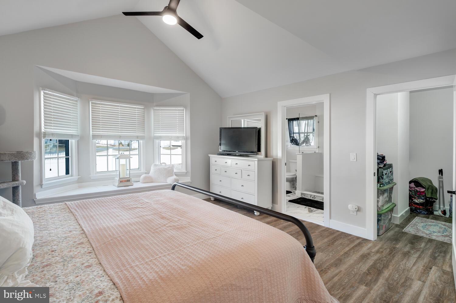 148 Compass Road Manahawkin, NJ 08050 - Photo 35 of 40 a spacious bedroom with a large bed and a window