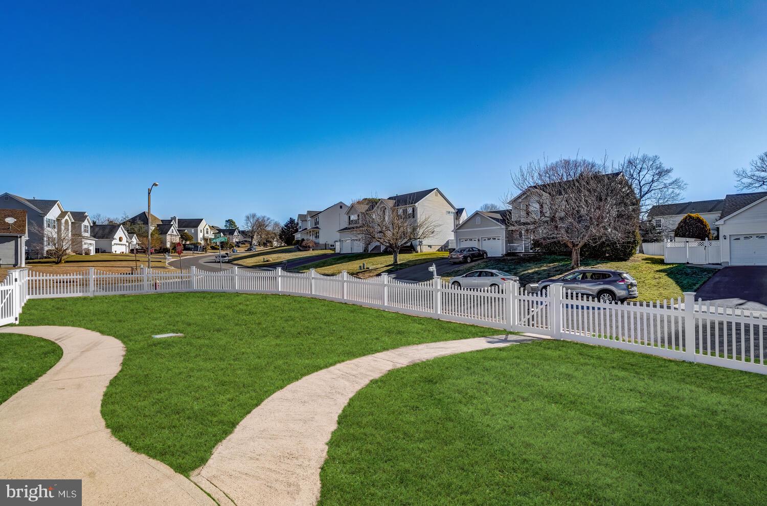 148 Compass Road Manahawkin, NJ 08050 - Photo 7 of 40 a view of a garden with houses