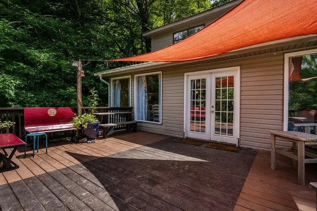 a kitchen with stainless steel appliances granite countertop a sink stainless steel appliances and cabinets