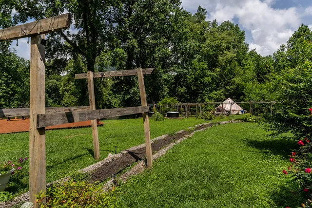 a garden view with a seating space