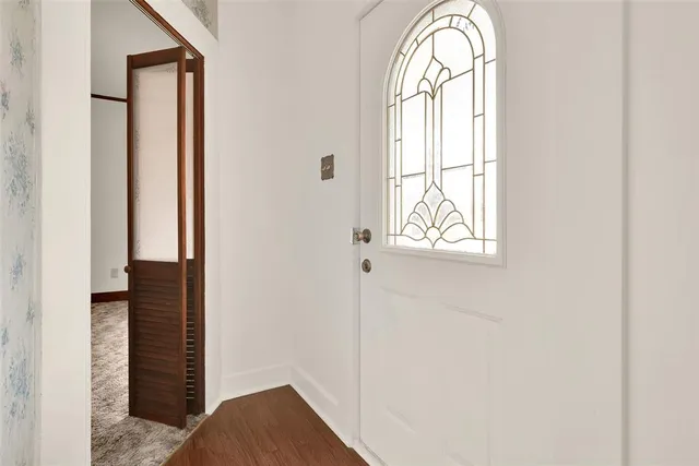 a view of front door with hallway