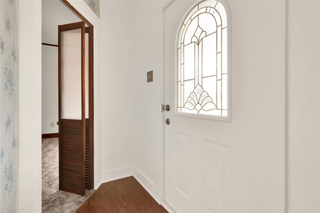 404 North Blanton Whitewright, TX 75491 - Photo 5 of 34 a view of front door with hallway