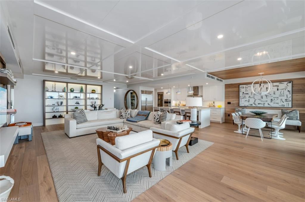 13925 Old Coast Road, Unit 403 Naples, FL 34110 - Photo 7 of 24 Living area featuring light wood-style floors and recessed lighting
