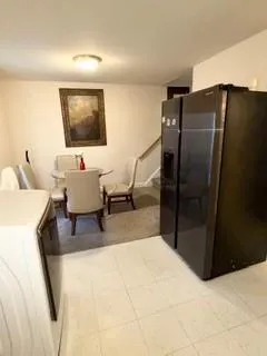 a living room with a couch and a flat screen tv