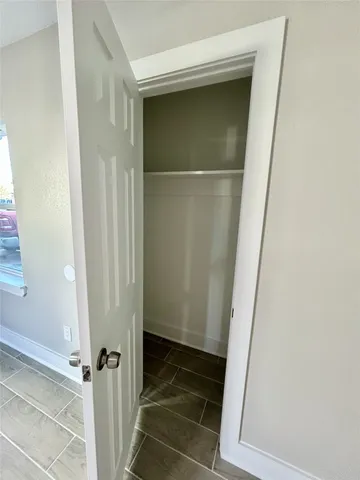 a bathroom with a glass door
