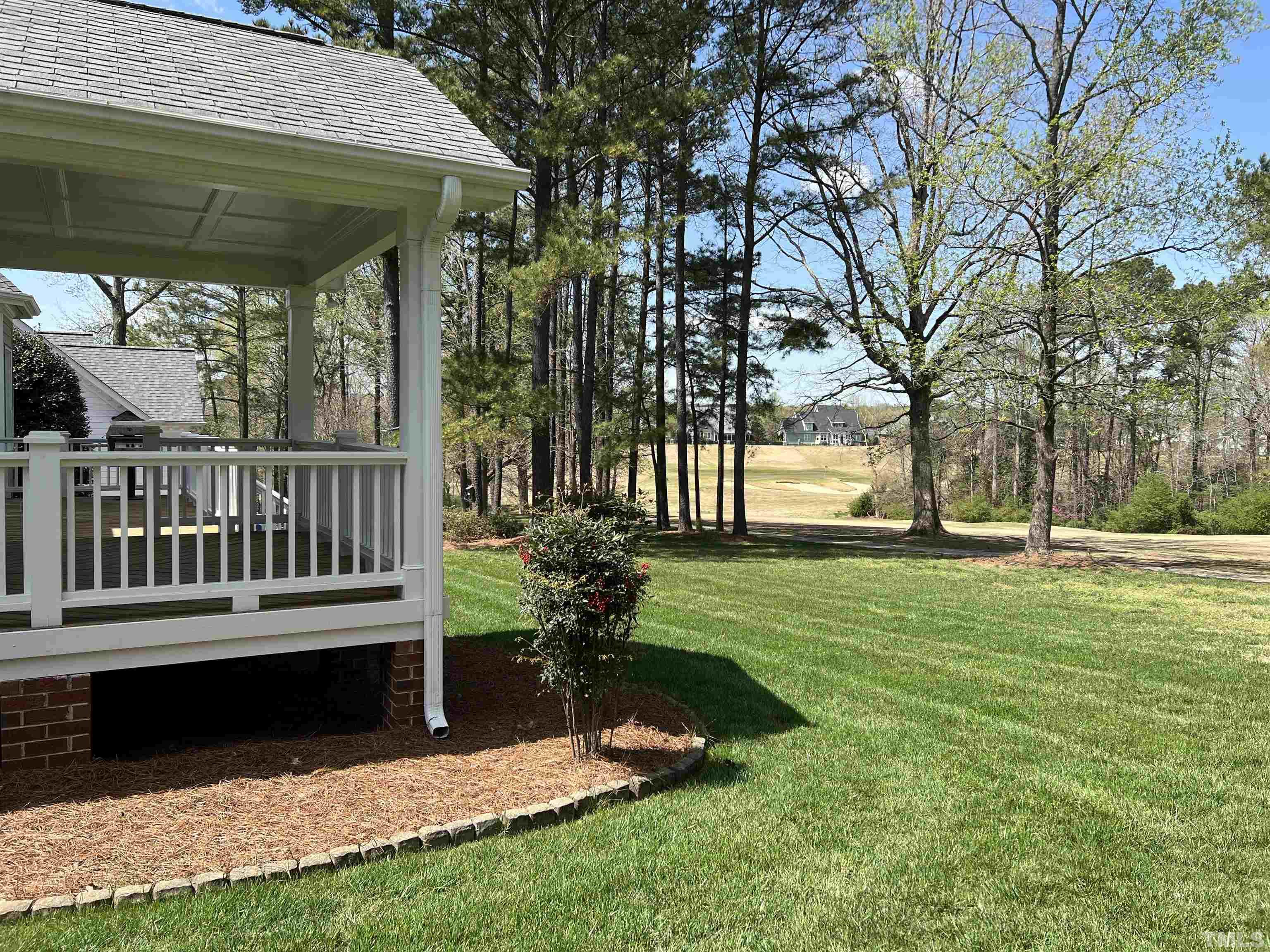 236 Waterville Street Raleigh, NC 27603 - Photo 2 of 30 a view of a house with backyard and a hammock