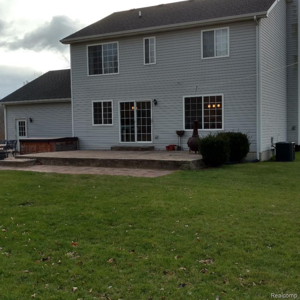 2420 Bull Run Road Oxford, MI 48371 - Photo 2 of 7 Back of House 2.jpg