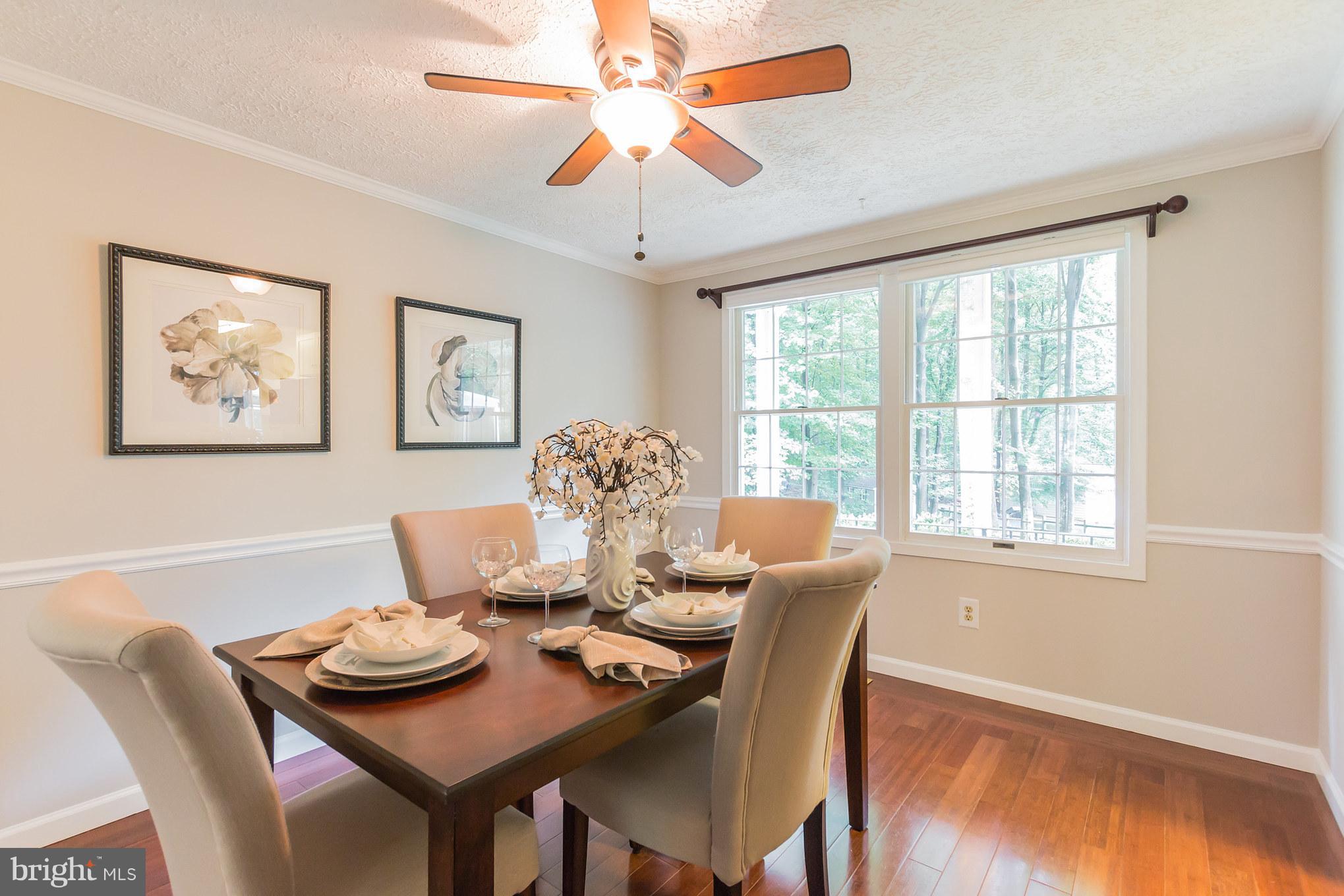 11935 Appling Valley Road Fairfax, VA 22030 - Photo 8 of 30 Chair rail, crown molding, bamboo floor, 2 windows