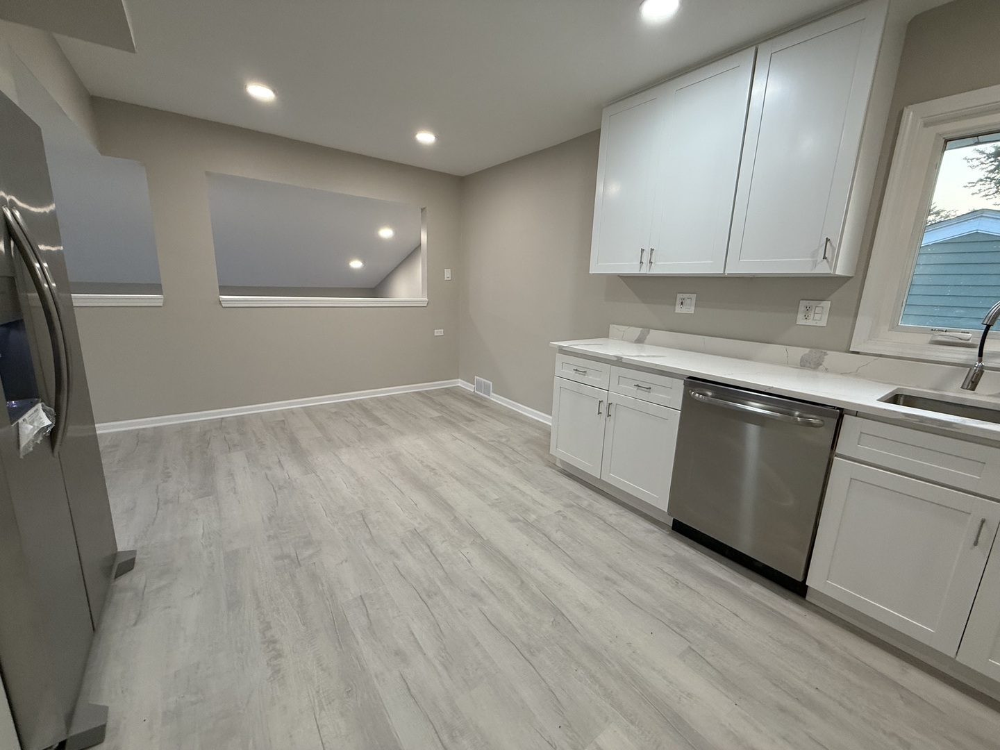 337 Woodland Drive Grayslake, IL 60030 - Photo 11 of 35 an empty room with wooden floor and window