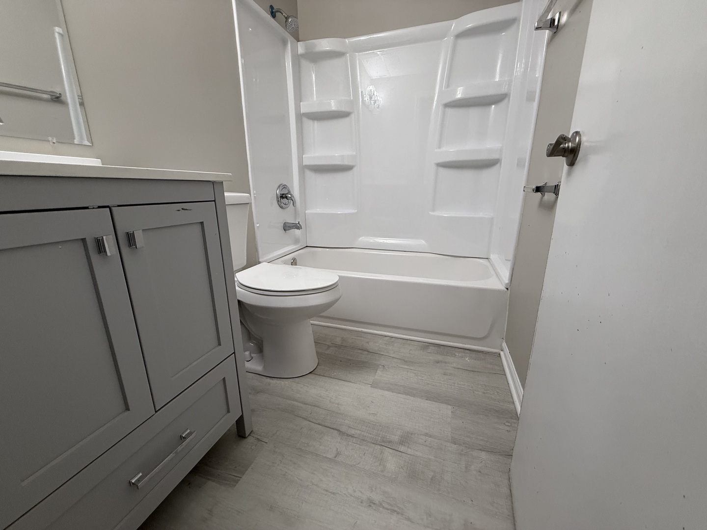337 Woodland Drive Grayslake, IL 60030 - Photo 23 of 35 a bathroom with a toilet and a shower