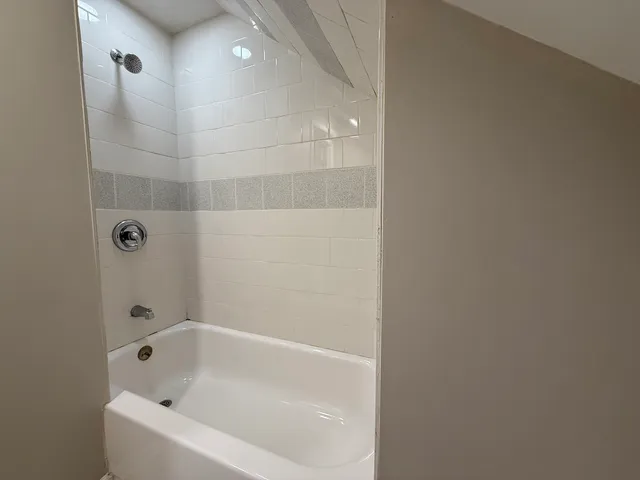 a bathroom with a bathtub