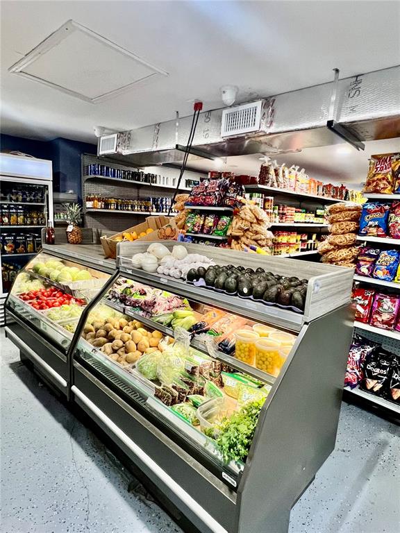 6101 Symmes Road Gibsonton, FL 33534 - Photo 14 of 21 a room with lots of wooden furniture