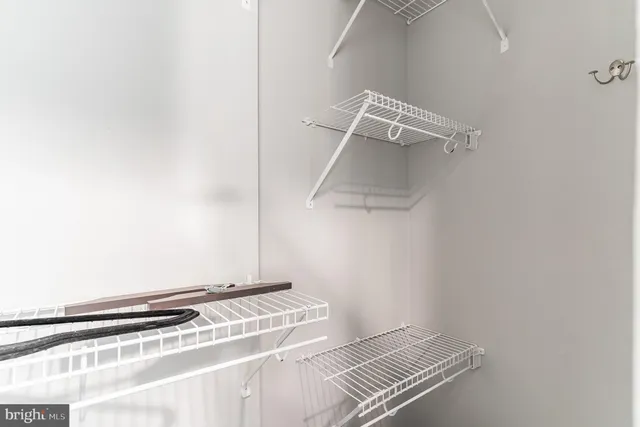 a view of a room with racks on the wall