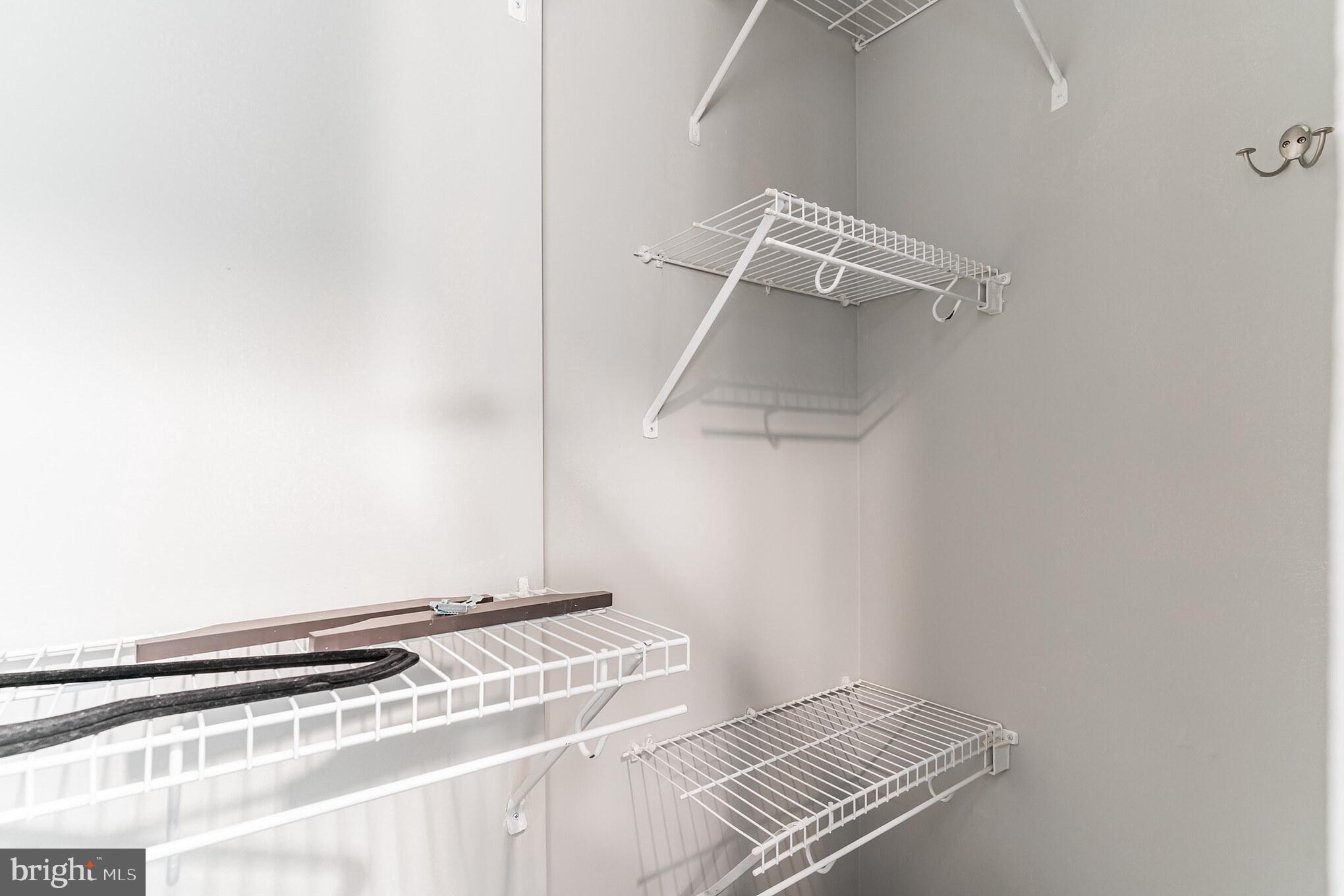 1208 1/2 33rd Street Northwest Washington, DC 20007 - Photo 20 of 30 a view of a room with racks on the wall