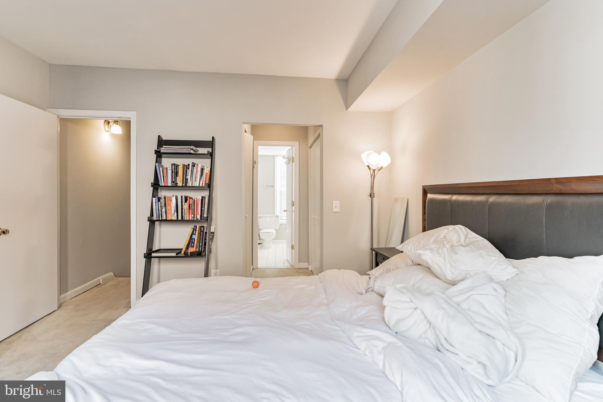 1208 1/2 33rd Street Northwest Washington, DC 20007 - Photo 29 of 30 a bedroom with a bed and a cabinets