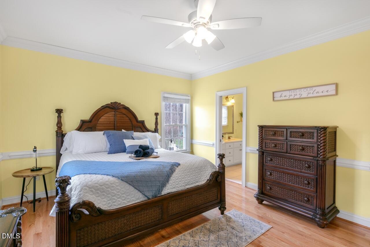 9199 Fox Run Road Bailey, NC 27807 - Photo 21 of 36 a bedroom with a bed and dresser