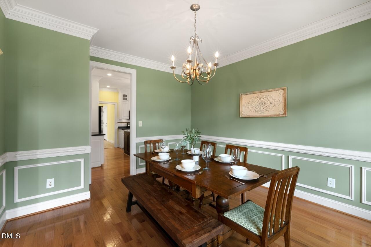 9199 Fox Run Road Bailey, NC 27807 - Photo 27 of 36 a view of a dining room with furniture and wooden floor