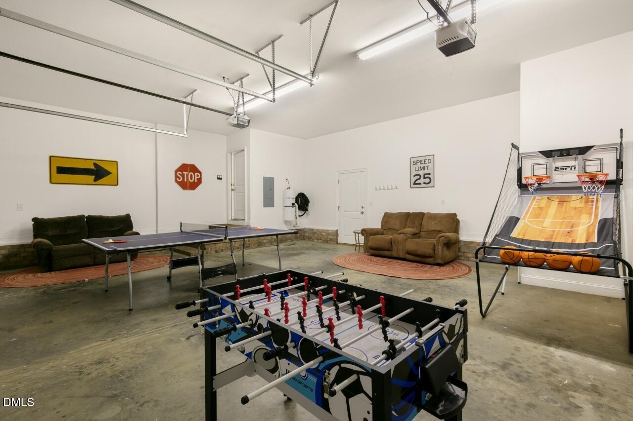 9199 Fox Run Road Bailey, NC 27807 - Photo 35 of 36 a living room with furniture and a flat screen tv