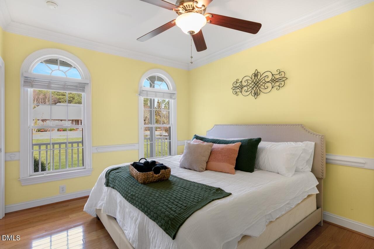 9199 Fox Run Road Bailey, NC 27807 - Photo 8 of 36 a bedroom with a bed and a window