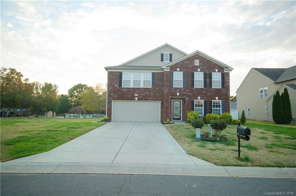 722 Chipmeadow Lane York, SC 29745 - Photo 1 of 13 a front view of a house with a yard