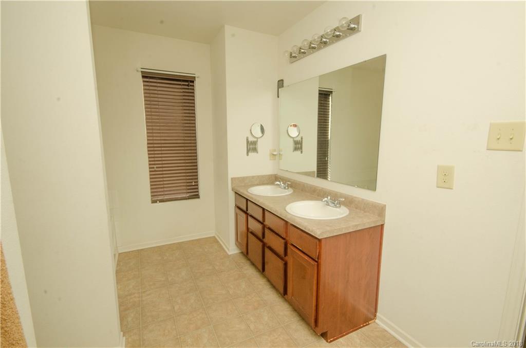 722 Chipmeadow Lane York, SC 29745 - Photo 7 of 13 a bathroom with a sink mirror and a bathtub