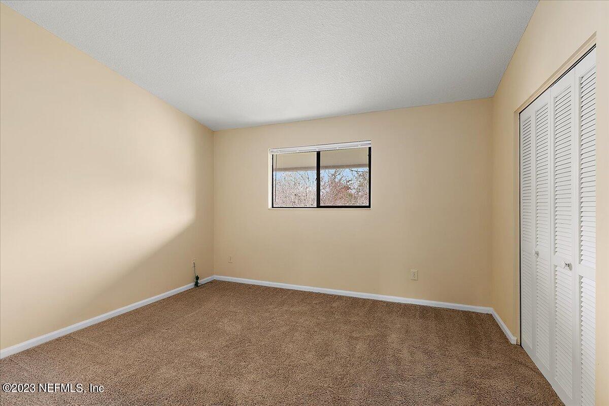 3801 Crown Point Road, Unit 1184 Jacksonville, FL 32257 - Photo 11 of 19 11-Primary Bedroom